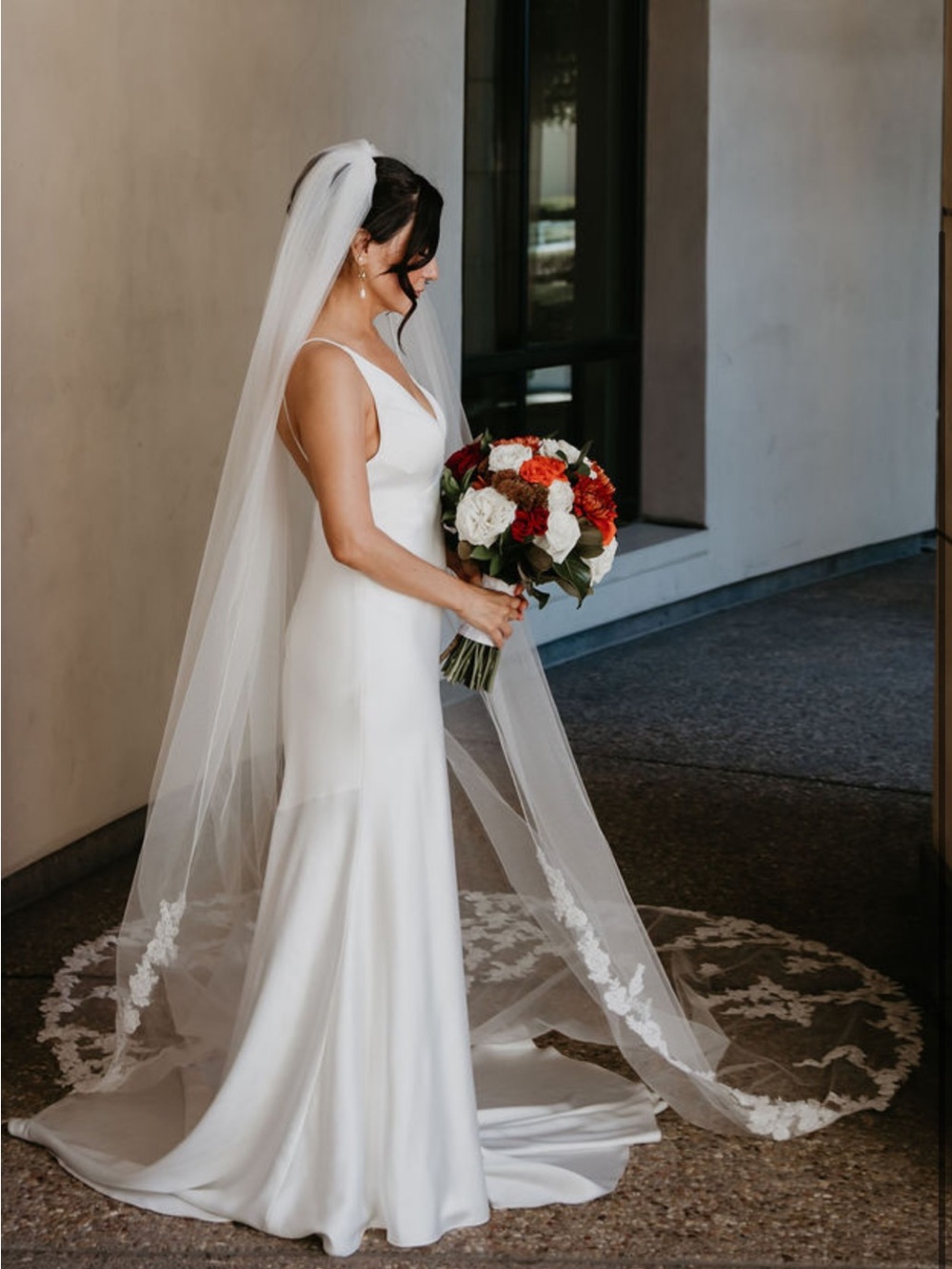 Ivory cathedral-length wedding veil and blusher